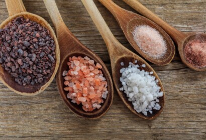 Variety of salts in wooden spoons