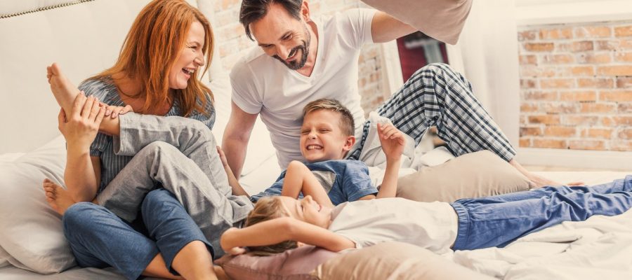 Young family being playful at home