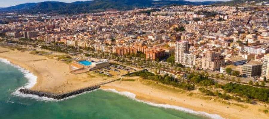 Picturesque aerial view of winter cityscape of Mataro on Mediterranean coast, Costa del Maresme, Spain